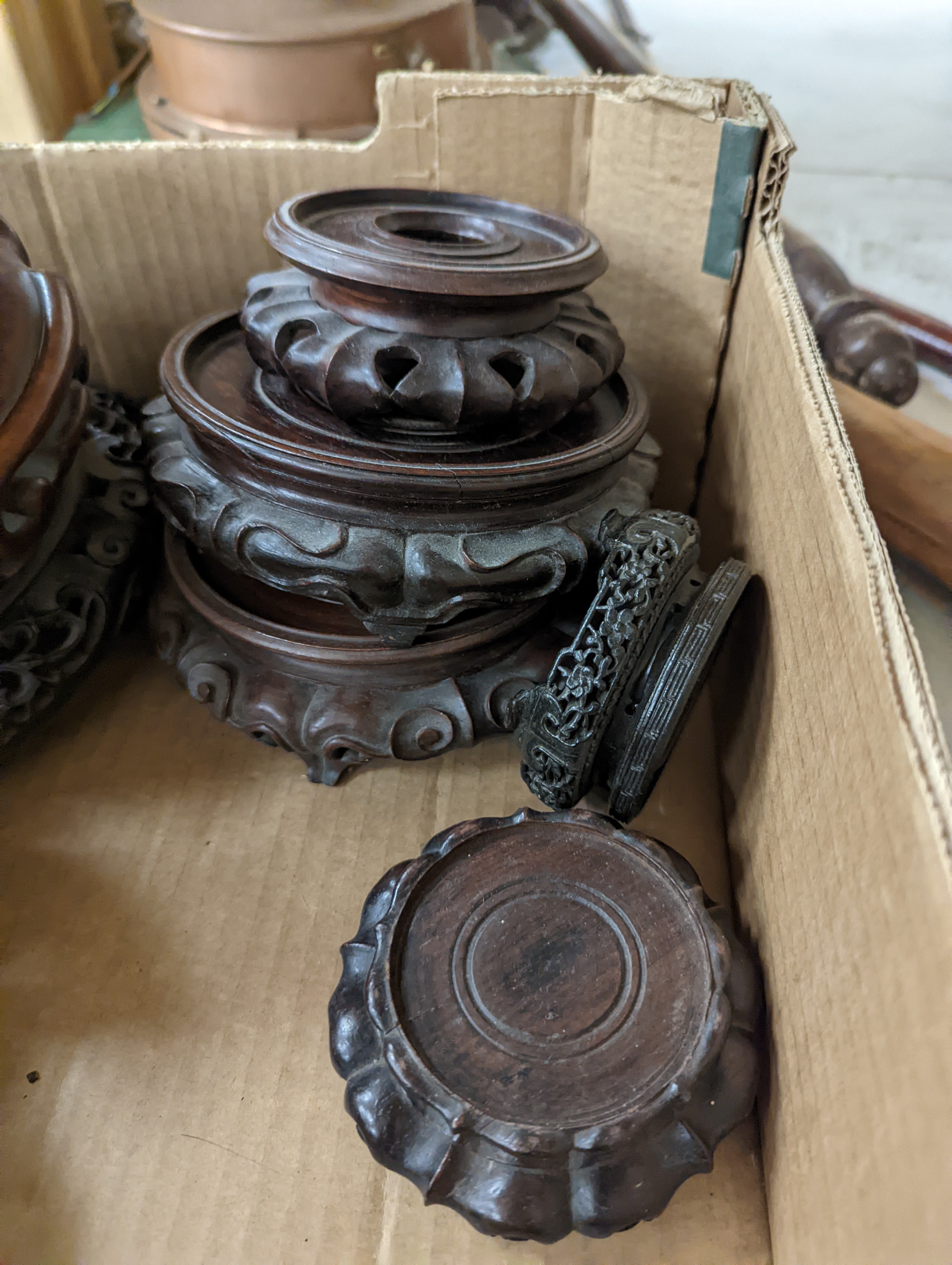 A collection of Chinese stands and bases, 1 box